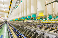 Adhesives for textile manufacturing equipment